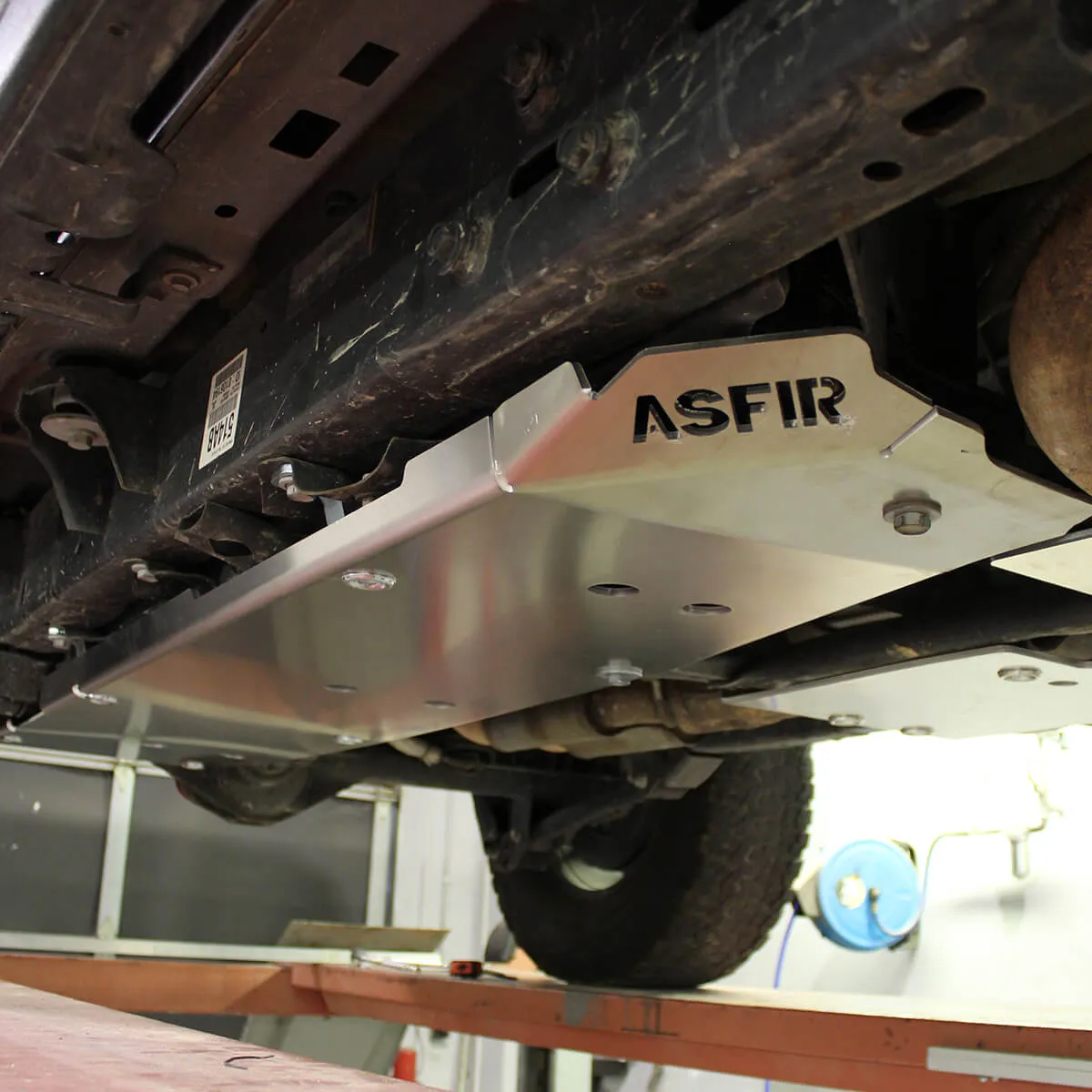 ASFIR fuel tank skid plate on a Nissan truck